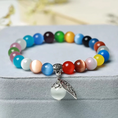 Armband kattenoog kralen multicolor met bedel blad